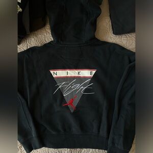 Unique Vintage Black Sweater with Red and White Accents